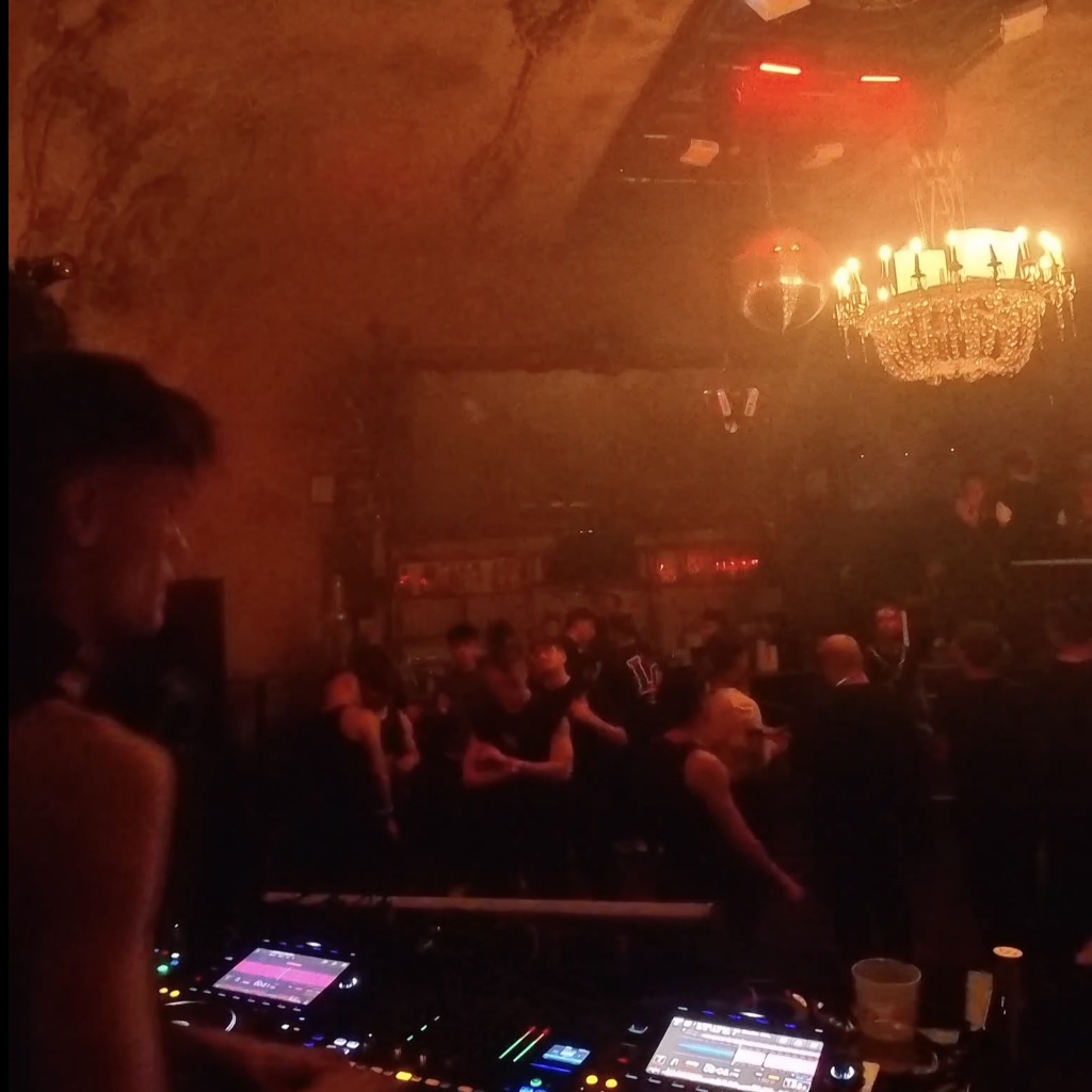 Crowd hands up in blue light